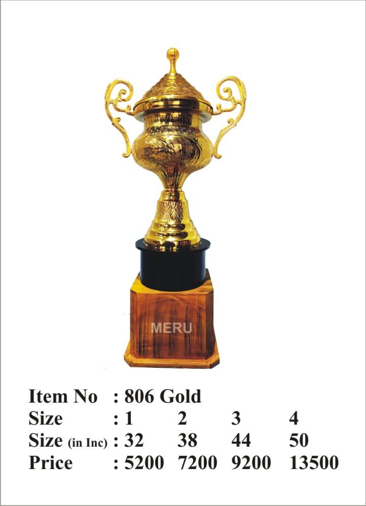Gold metal trophy with intricate design on a wooden base. Ideal for awards and recognition.