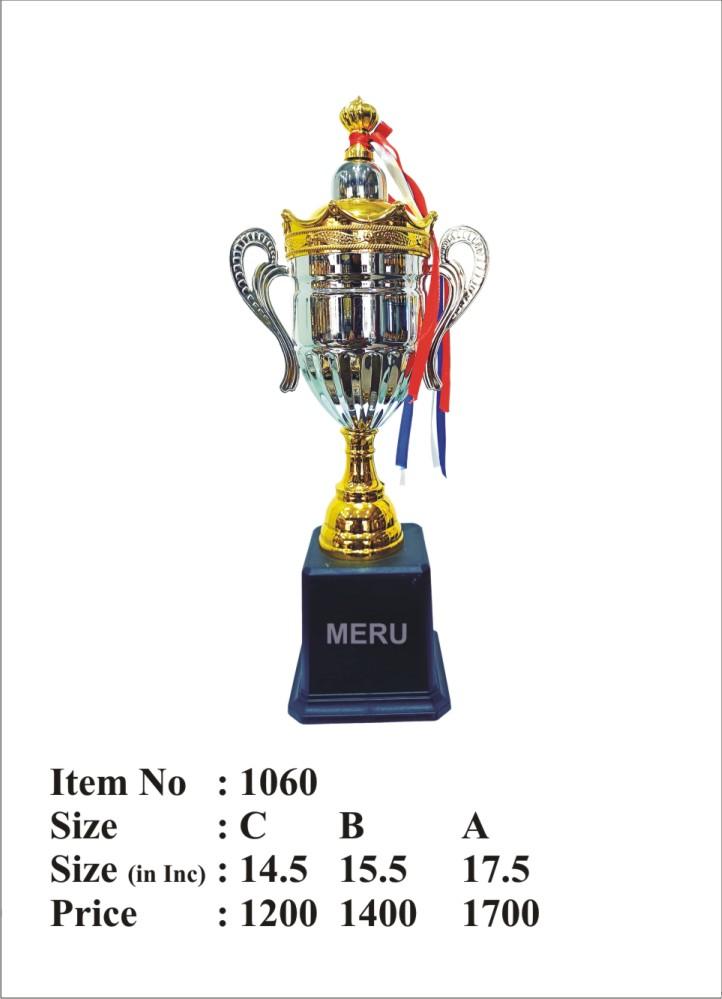 Elegant metal trophy with gold accents and red; white; and blue ribbons.