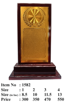 Wooden memento with gold plate for awards and recognition.