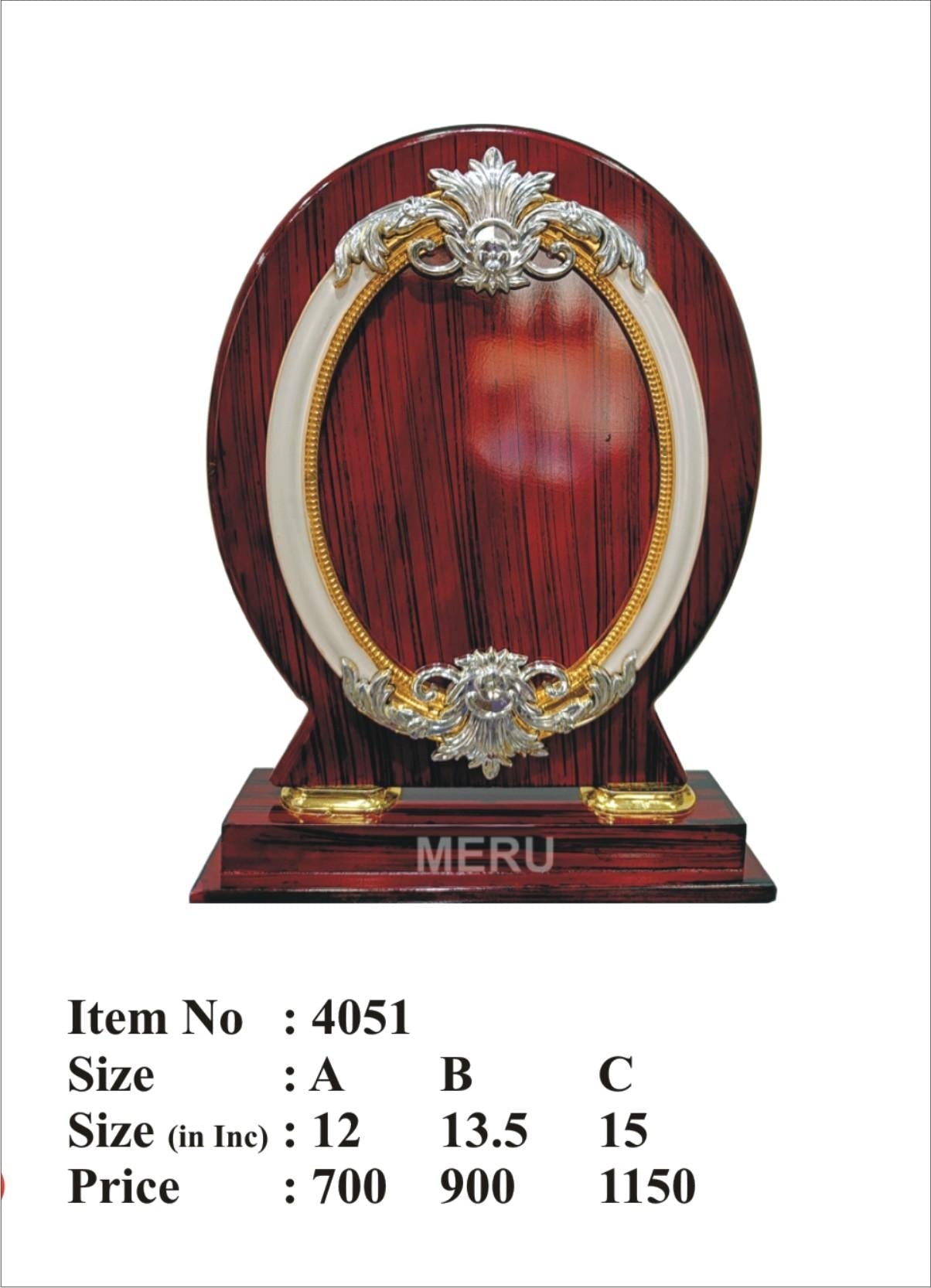 Close-up of a wooden mementos plaque with silver and gold accents