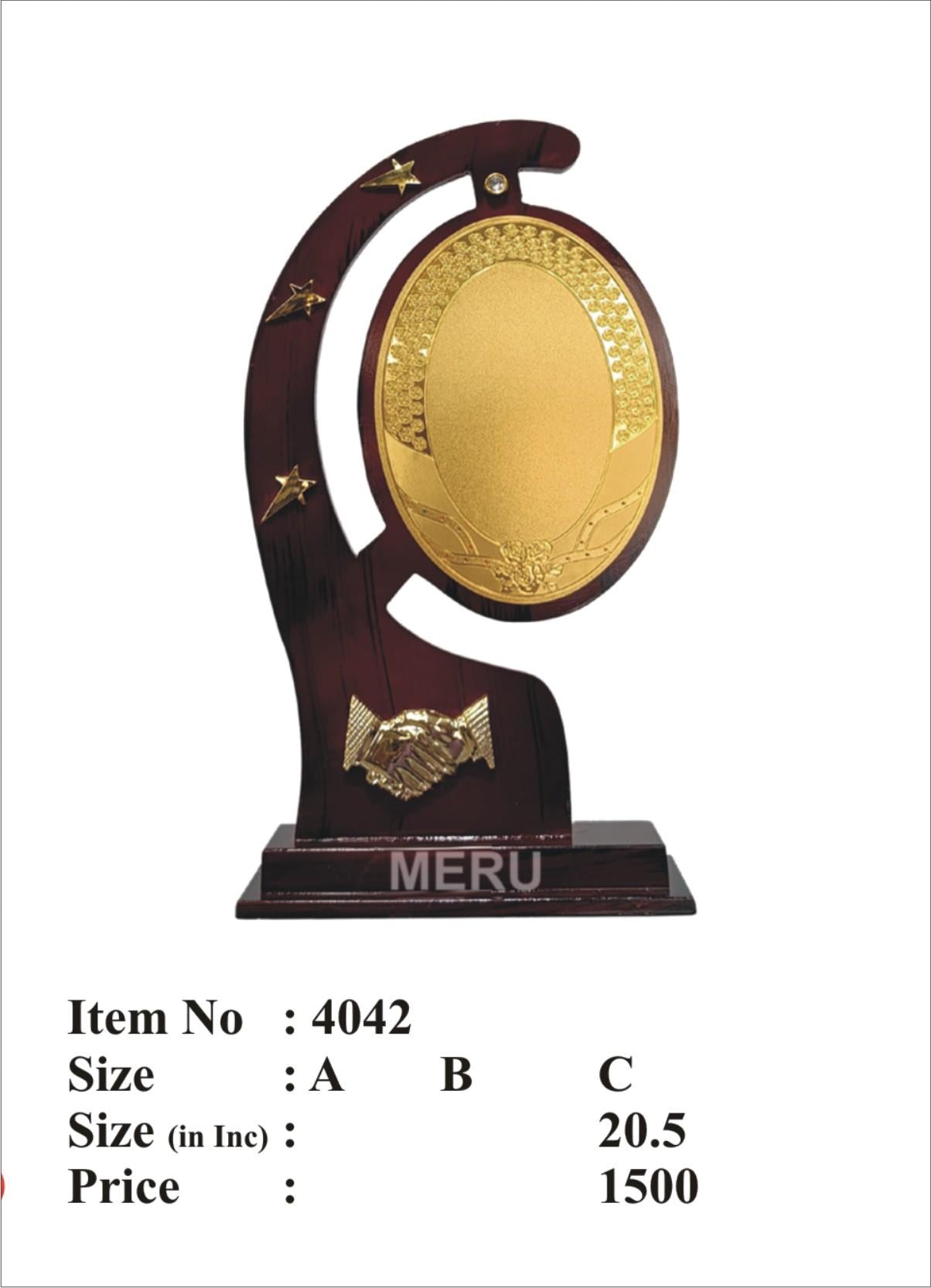Wooden memento with gold plate for award or recognition.