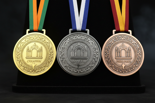 High quality gold silver and bronze custom medals for athletic recognition awards and sports trophies in India.