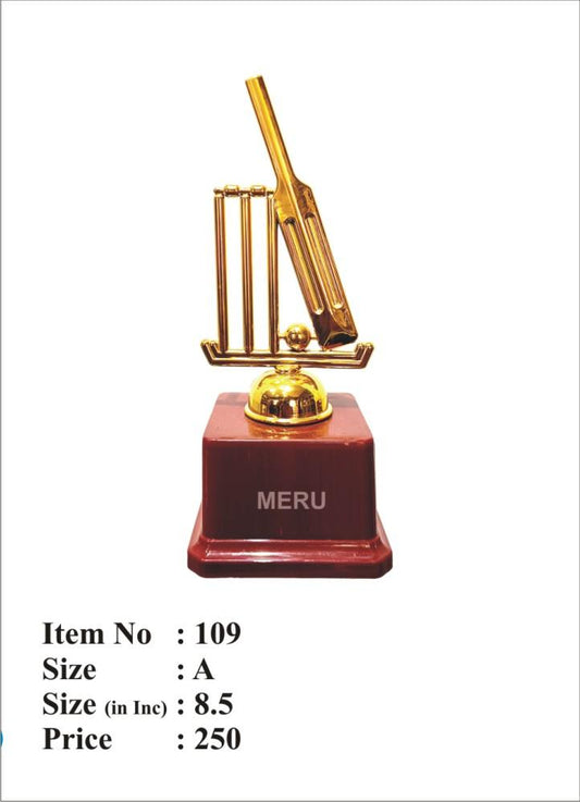 Golden cricket bat and wickets trophy