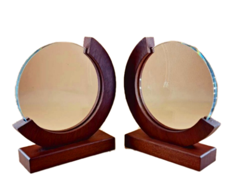 Clear glass corporate trophy on a wooden base