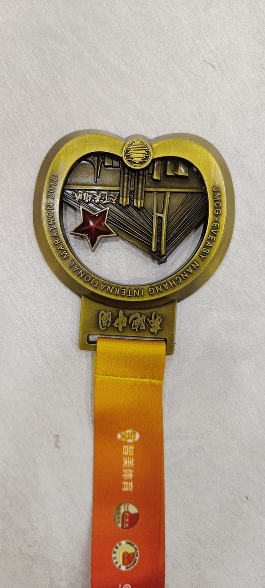 Custom marathon medal with orange lanyard and Chinese characters. Perfect sports medals and awards related to sports.
