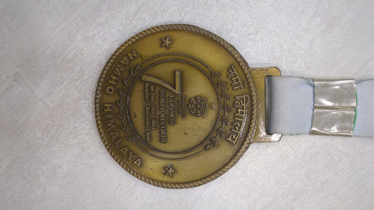 Custom Guinness World Record medal with lanyard ribbon.