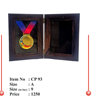 Wooden memento with gold medal