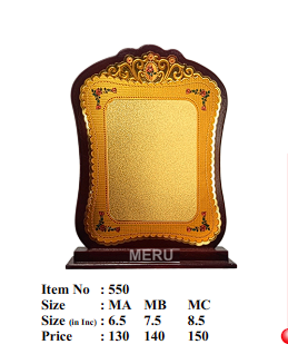 Close-up of a wooden memento award with gold plaque; ideal for custom trophy